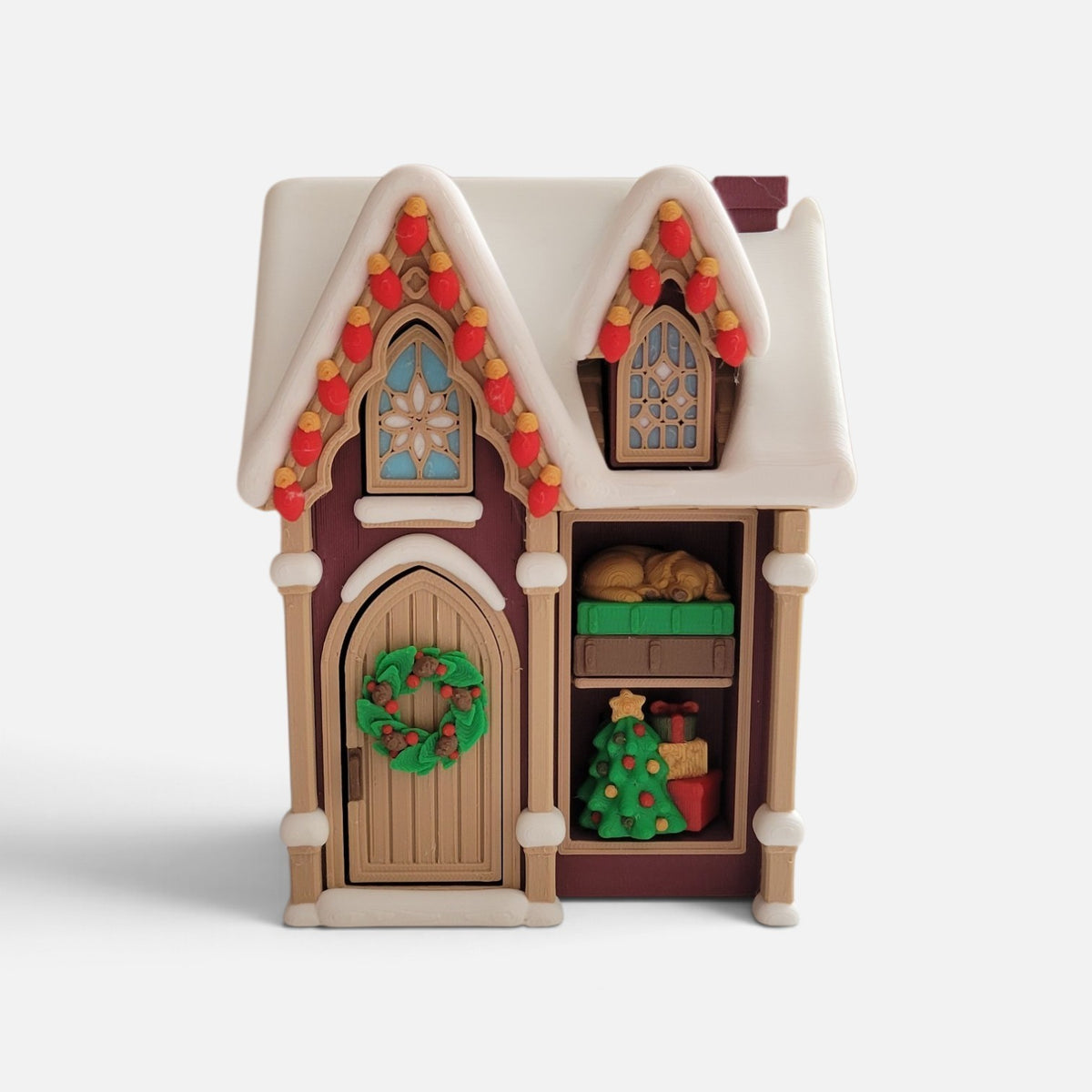 Christmas house fidget clicker by The Salty Cat Co with six smooth clicking mechanisms and 3D printed plastic