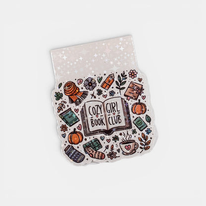 Decorative bookmark with 'Cozy Girl Book Club' design on a white background