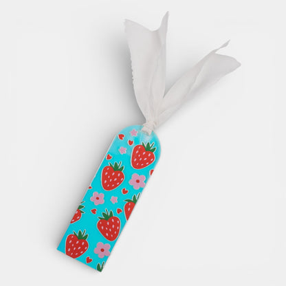 Holographic bookmark with strawberry and flower pattern on a white background