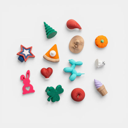 Mini holiday decorations to decorate a mini bookshelf on white background