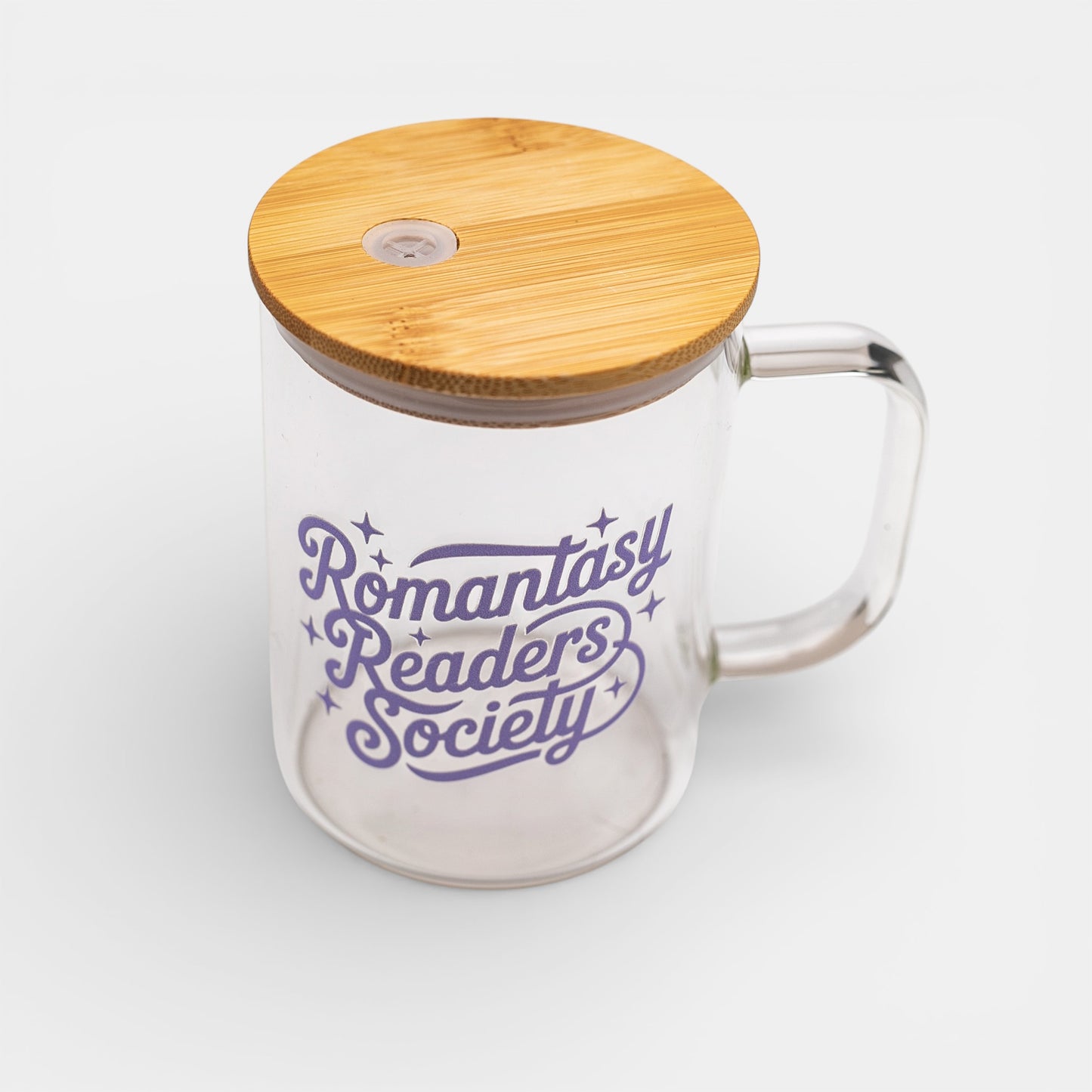 Glass mug with bamboo lid and 'Romantasy Readers Society' text on a white background