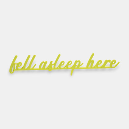 The Salty Cat Co yellow Fell Asleep Here bookmark with cursive lettering for book lovers.