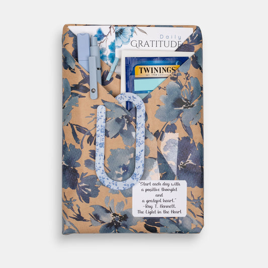 Wrapped journal gift set on a white background